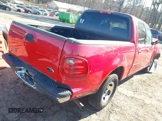 2003 Ford F-150 XLT with VIN 1FTRW07L03KC47484, listed as a IAAI auction lot 41653389 with 283,296 mi miles. Bid and sale history available at carsss.com. Image 4.