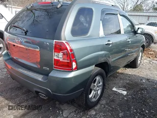 2009 Kia Sportage LX with VIN KNDJE723197563651, listed as a IAAI auction lot 41477610 with 168,797 mi miles and . Bid and sale history available at carsss.com. Image 4.