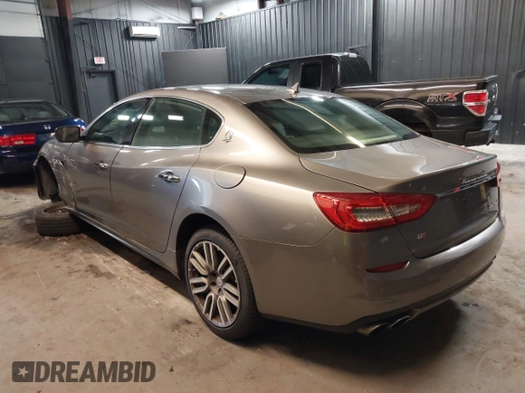 2015 Maserati Quattroporte S Q4 z VIN ZAM56RRAXF1158381, wystawiony jako IAAI lot #39717772 z przebiegiem 100 836 mil mil oraz . Historia ofert i sprzedaży dostępna na DreamBid. Obrazek 3.