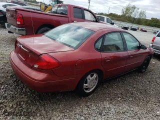 2002 Ford Taurus LX with VIN 1FAFP52U82A270129, listed as a Copart auction lot 69884974 with 79,590 mi miles and Salvage Title. Bid and sale history available at carsss.com. Image 3.