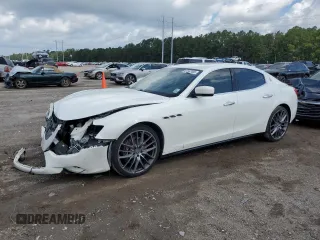 2015 Maserati Ghibli S Q4 with VIN ZAM57RTA2F1130239, listed as a Copart auction lot 61567495 with 75,008 mi miles and Salvage title. Bid and sale history available at DreamBid. Image 1.