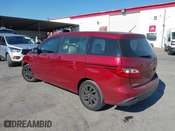 2014 Mazda 5 Sport with VIN JM1CW2BL9E0168662, listed as a IAAI auction lot 42726429 with 145,190 mi miles and . Bid and sale history available at DreamBid. Image 3.