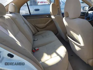 2004 Honda Civic LX with VIN 2HGES16574H586644, listed as a IAAI auction lot 40991883 with 199,336 mi miles. Bid and sale history available at carsss.com. Image 8.