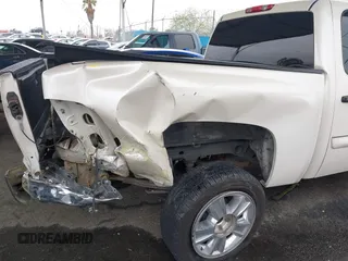 2013 Chevrolet Silverado 1500 LT with VIN 3GCPCSE06DG187949, listed as a IAAI auction lot 41799296 with 169,919 mi miles and . Bid and sale history available at DreamBid. Image 18.