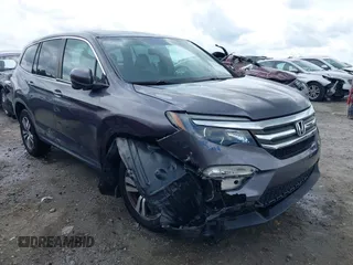 2017 Honda Pilot EX-L with VIN 5FNYF6H77HB007143, listed as a IAAI auction lot 42446452 with 65,824 mi miles and . Bid and sale history available at DreamBid. Image 1.