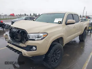 2016 Toyota Tacoma SR5 with VIN 3TMDZ5BN3GM003351, listed as a IAAI auction lot 41721932 with 100,774 mi miles and . Bid and sale history available at DreamBid. Image 20.