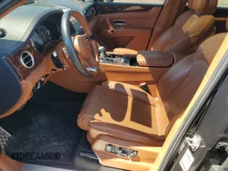 2017 Bentley Bentayga W12 z VIN SJAAC2ZV2HC014547, wystawiony jako Copart lot #57488755 z przebiegiem 63 359 mil mil oraz Tytuł czysty. Historia ofert i sprzedaży dostępna na DreamBid. Obrazek 7.