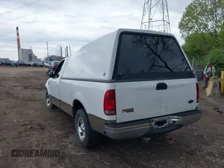 2003 Ford F-150 XL with VIN 1FTRF17L23NB95487, listed as a IAAI auction lot 42154868 with 187,000 mi miles and . Bid and sale history available at DreamBid. Image 3.