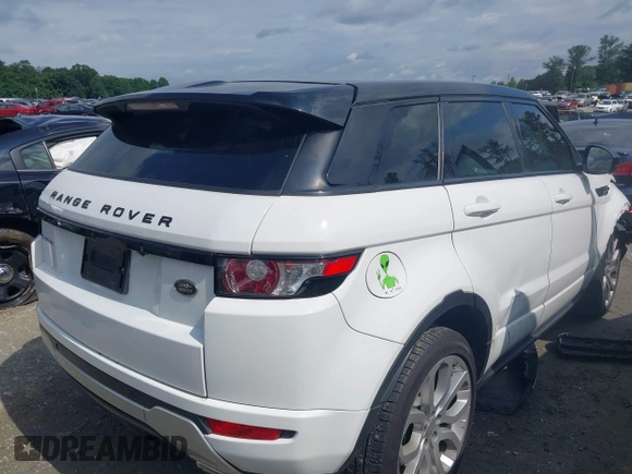 2014 Land Rover Range Rover Evoque Dynamic with VIN SALVT2BG0EH893971, listed as a IAAI auction lot 42445559 with 124,229 mi miles and . Bid and sale history available at DreamBid. Image 4.