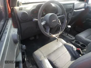 2009 Jeep Wrangler X with VIN 1J4FA24119L756089, listed as a Copart auction lot 56953205 with 158,157 mi miles and Salvage title. Bid and sale history available at DreamBid. Image 8.