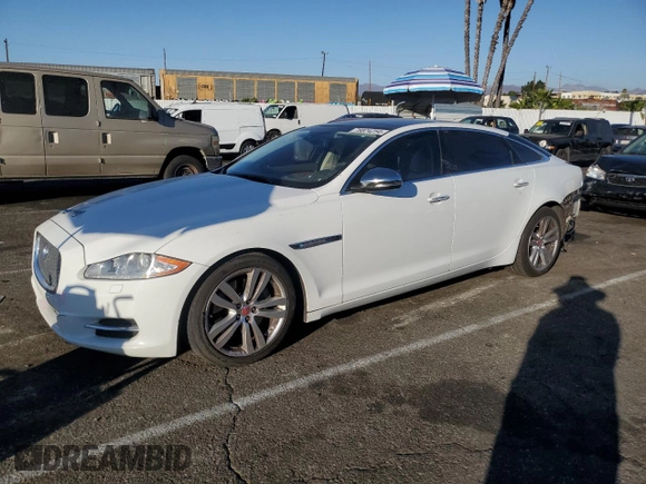 2014 Jaguar XJ with VIN SAJWA2GZ7E8V66626, listed as a Copart auction lot 78824254 with 132,720 mi miles and Salvage Title. Bid and sale history available at carsss.com. Image 1.