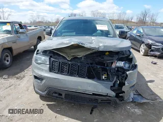 2019 Jeep Grand Cherokee Upland with VIN 1C4RJFAG5KC608293, listed as a IAAI auction lot 41989929 with 129,229 mi miles. Bid and sale history available at carsss.com. Image 12.