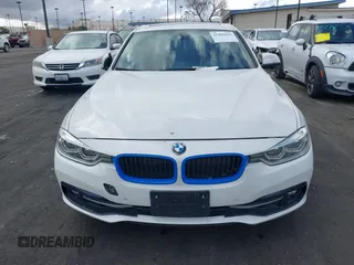 2017 BMW 3 Series 330e iPerformance with VIN WBA8E1C51HK895223, listed as a IAAI auction lot 41492625 with 116,486 mi miles. Bid and sale history available at carsss.com. Image 12.