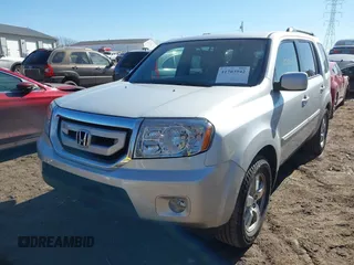 2009 Honda Pilot EX with VIN 5FNYF48479B002570, listed as a IAAI auction lot 41703942 with 146,405 mi miles. Bid and sale history available at carsss.com. Image 17.