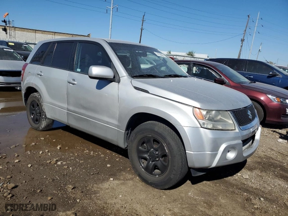 2012 Suzuki Grand Vitara Premium with VIN JS3TD0D21C4100409, listed as a Copart auction lot 74739464 with 133,412 mi miles and Salvage Title. Bid and sale history available at carsss.com. Image 4.