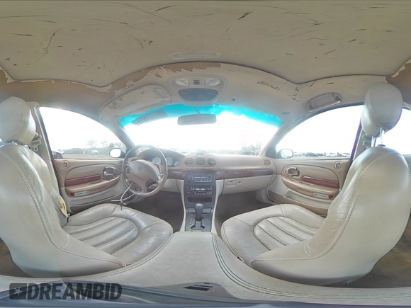 1999 Chrysler 300M M z VIN 2C3HE66G7XH727061, wystawiony jako Copart lot #51304975 z przebiegiem 150 213 mil mil oraz Szkoda całkowita • Salvage title. Historia ofert i sprzedaży dostępna na DreamBid. Obrazek 13.