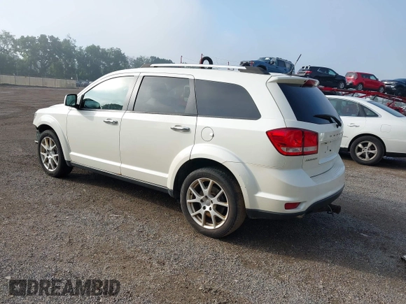 2013 Dodge Journey Crew with VIN 3C4PDCDG0DT591533, listed as a IAAI auction lot 42630548 with 164,961 mi miles and . Bid and sale history available at DreamBid. Image 3.