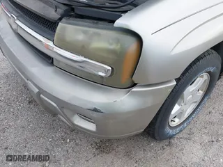 2002 Chevrolet TrailBlazer LTZ with VIN 1GNDS13S422222859, listed as a IAAI auction lot 42001726 with 288,530 mi miles. Bid and sale history available at carsss.com. Image 6.