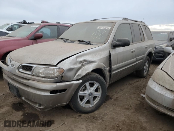 2003 Oldsmobile Bravada z VIN 1GHDT13S832324067, wystawiony jako Copart lot #83346624 z przebiegiem 101 670 mil mil oraz Nie do naprawy. Historia ofert i sprzedaży dostępna na DreamBid. Obrazek 1.