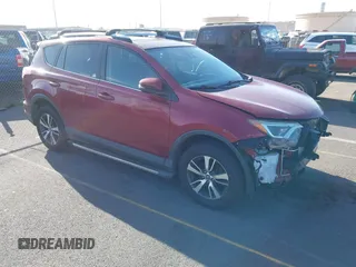 2018 Toyota RAV4 XLE with VIN JTMWFREV0JD126287, listed as a IAAI auction lot 41742295 with 162,023 mi miles and . Bid and sale history available at DreamBid. Image 1.