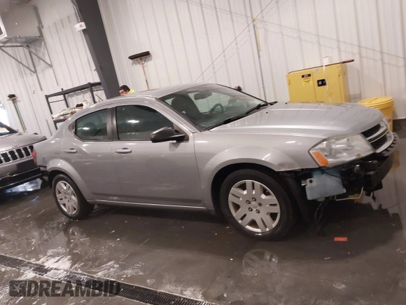2014 Dodge Avenger SE z VIN 1C3CDZAB4EN228880, wystawiony jako IAAI lot #41605761 z przebiegiem 97 437 mil mil oraz . Historia ofert i sprzedaży dostępna na DreamBid. Obrazek 14.