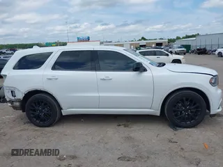 2015 Dodge Durango SXT with VIN 1C4RDHAG1FC201323, listed as a IAAI auction lot 42376596 with 139,805 mi miles and . Bid and sale history available at DreamBid. Image 14.