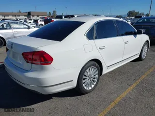 2015 Volkswagen Passat 1.8T SE w/Sunroof & Nav with VIN 1VWBT7A3XFC075648, listed as a IAAI auction lot 40808040 with 189,620 mi miles. Bid and sale history available at carsss.com. Image 4.