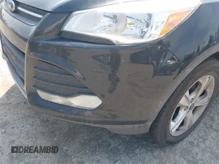 2013 Ford Escape SE z VIN 1FMCU0GX1DUD55435, wystawiony jako IAAI lot #42575683 z przebiegiem 205 271 mil mil oraz . Historia ofert i sprzedaży dostępna na DreamBid. Obrazek 6.