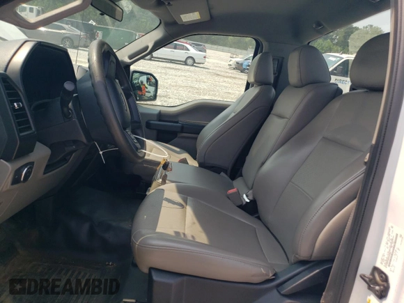 2019 Ford F-150 XL with VIN 1FTMF1CB9KKE43869, listed as a Copart auction lot 57331515 with 164,061 mi miles and Salvage title. Bid and sale history available at DreamBid. Image 7.