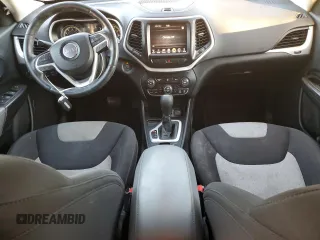 2014 Jeep Cherokee Latitude z VIN 1C4PJLCS2EW168480, wystawiony jako Copart lot #83882874 z przebiegiem 176 420 mil mil oraz Szkoda całkowita • Salvage title. Historia ofert i sprzedaży dostępna na DreamBid. Obrazek 8.