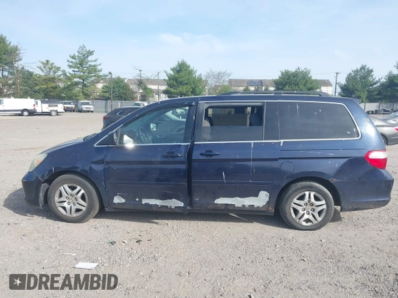 2005 Honda Odyssey EX with VIN 5FNRL38455B135555, listed as a IAAI auction lot 42080079 with 149,468 mi miles and . Bid and sale history available at carsss.com. Image 14.