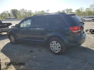 2014 Dodge Journey SE with VIN 3C4PDCAB2ET227916, listed as a Copart auction lot 52492955 with Not provided miles and Salvage title. Bid and sale history available at DreamBid. Image 2.