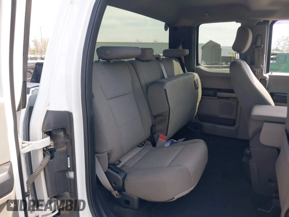 2018 Ford F-150 XL with VIN 1FTEX1EB4JFA77373, listed as a IAAI auction lot 41813197 with 235,251 mi miles and . Bid and sale history available at DreamBid. Image 8.