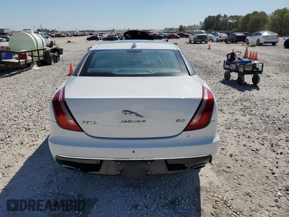 2016 Jaguar XJ Portfolio with VIN SAJWA2G79G8W00955, listed as a Copart auction lot 77650194 with 60,515 mi miles and Clean title. Bid and sale history available at DreamBid. Image 6.