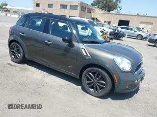2011 MINI Countryman S with VIN WMWZC5C52BWL54571, listed as a IAAI auction lot 42433602 with 111,161 mi miles and . Bid and sale history available at DreamBid. Image 1.