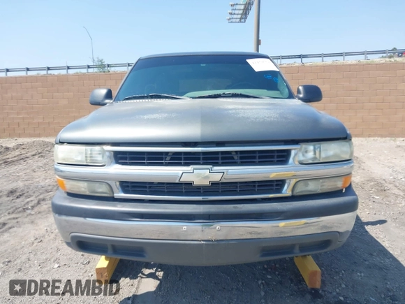2001 Chevrolet Tahoe LS z VIN 1GNEC13T51J153677, wystawiony jako IAAI lot #42459552 z przebiegiem 201 209 mil mil oraz . Historia ofert i sprzedaży dostępna na DreamBid. Obrazek 12.