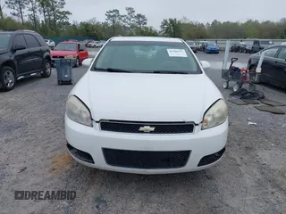 2013 Chevrolet Impala LTZ with VIN 2G1WC5E39D1202260, listed as a IAAI auction lot 41908155 with 210,193 mi miles and . Bid and sale history available at DreamBid. Image 12.