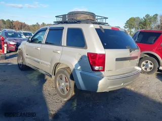 2007 Jeep Grand Cherokee Laredo with VIN 1J8GS48K07C630303, listed as a IAAI auction lot 40993022 with 254,294 mi miles. Bid and sale history available at carsss.com. Image 3.