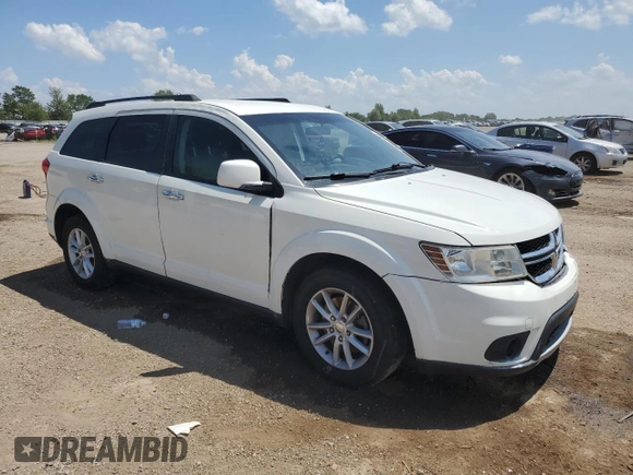 2015 Dodge Journey SXT with VIN 3C4PDCBG5FT628212, listed as a Copart auction lot 60663695 with 145,024 mi miles and Salvage title. Bid and sale history available at DreamBid. Image 4.