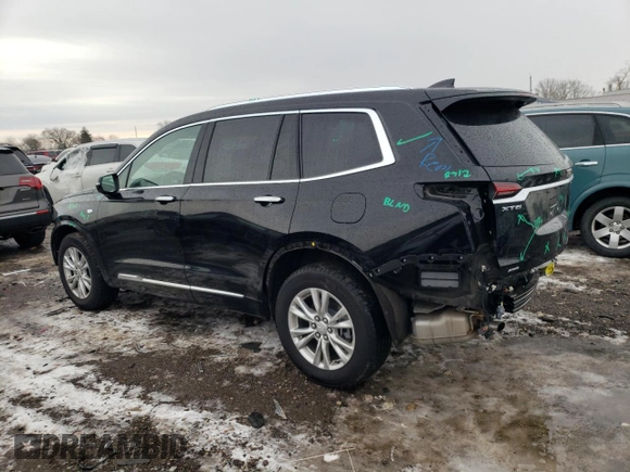 2023 Cadillac XT6 AWD Luxury z VIN 1GYKPBR45PZ159666, wystawiony jako Copart lot #39370954 z przebiegiem 12 778 mil mil oraz . Historia ofert i sprzedaży dostępna na DreamBid. Obrazek 2.