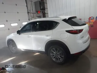 2021 Mazda CX-5 Grand Touring with VIN JM3KFADM3M0312143, listed as a IAAI auction lot 41606582 with 46,515 mi miles. Bid and sale history available at carsss.com. Image 14.