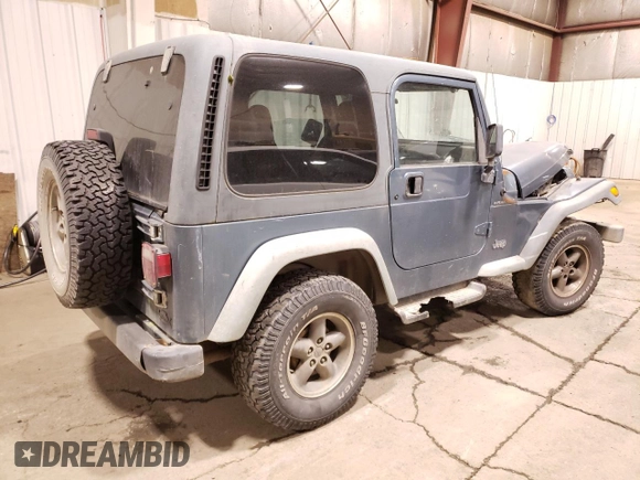 1999 Jeep Wrangler SE with VIN 1J4FY29P0XP412753, listed as a Copart auction lot 47015985 with 137,388 mi miles and Salvage Title. Bid and sale history available at carsss.com. Image 3.
