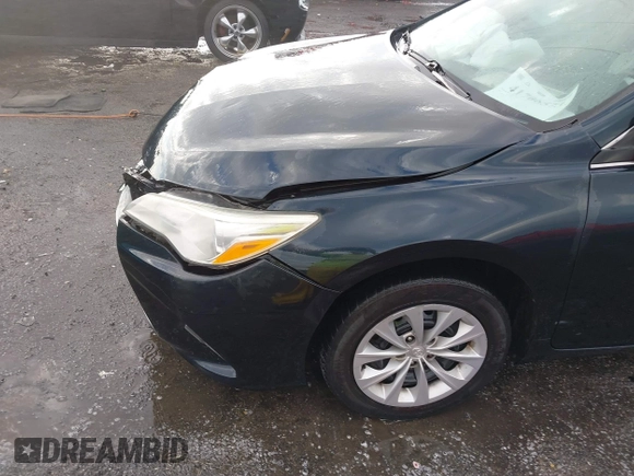 2015 Toyota Camry XLE with VIN 4T1BF1FK4FU043212, listed as a IAAI auction lot 41706573 with 170,074 mi miles and . Bid and sale history available at DreamBid. Image 18.