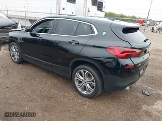 2022 BMW X2 xDrive28i with VIN WBXYJ1C01N5U20171, listed as a IAAI auction lot 41284932 with 64,256 mi miles. Bid and sale history available at carsss.com. Image 3.