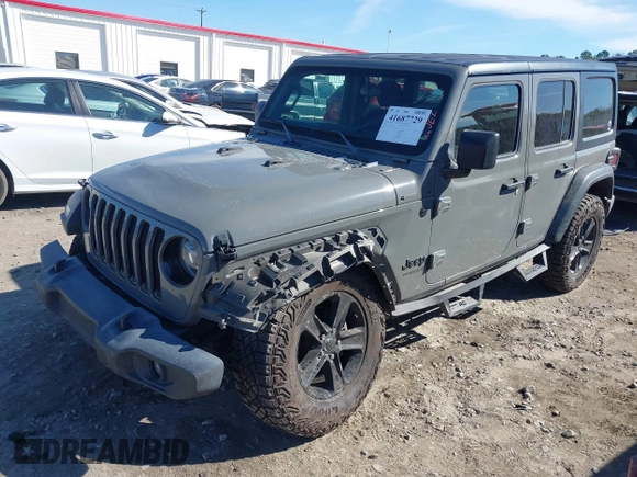 2021 Jeep Wrangler Unlimited Willys with VIN 1C4HJXDM6MW587152, listed as a IAAI auction lot 41687729 with 59,730 mi miles and . Bid and sale history available at DreamBid. Image 17.