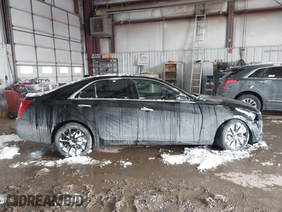 2016 Cadillac CTS Luxury Collection AWD with VIN 1G6AX5SX6G0111768, listed as a IAAI auction lot 41563991 with 76,718 mi miles and . Bid and sale history available at DreamBid. Image 13.