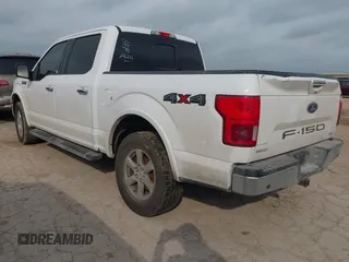 2018 Ford F-150 XL with VIN 1FTEW1EG5JKD32988, listed as a IAAI auction lot 42099086 with 127,541 mi miles. Bid and sale history available at carsss.com. Image 3.