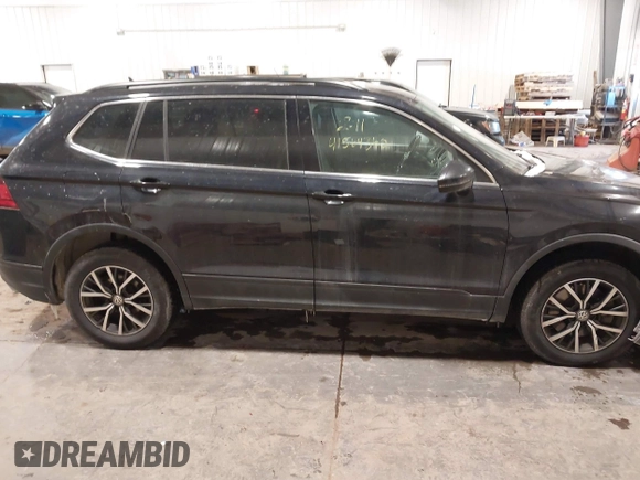 2019 Volkswagen Tiguan SE with VIN 3VV2B7AX3KM017948, listed as a IAAI auction lot 41564360 with 129,302 mi miles and . Bid and sale history available at DreamBid. Image 14.