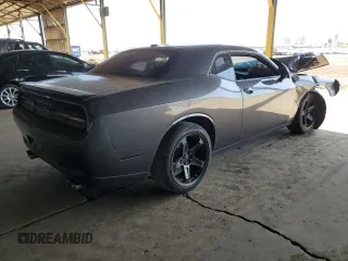 2015 Dodge Challenger R/T with VIN 2C3CDZAT1FH865454, listed as a Copart auction lot 53930725 with 104,481 mi miles and Salvage title. Bid and sale history available at DreamBid. Image 3.