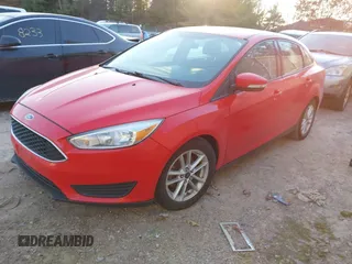 2016 Ford Focus SE with VIN 1FADP3F27GL271322, listed as a IAAI auction lot 41445039 with 100,195 mi miles. Bid and sale history available at carsss.com. Image 2.